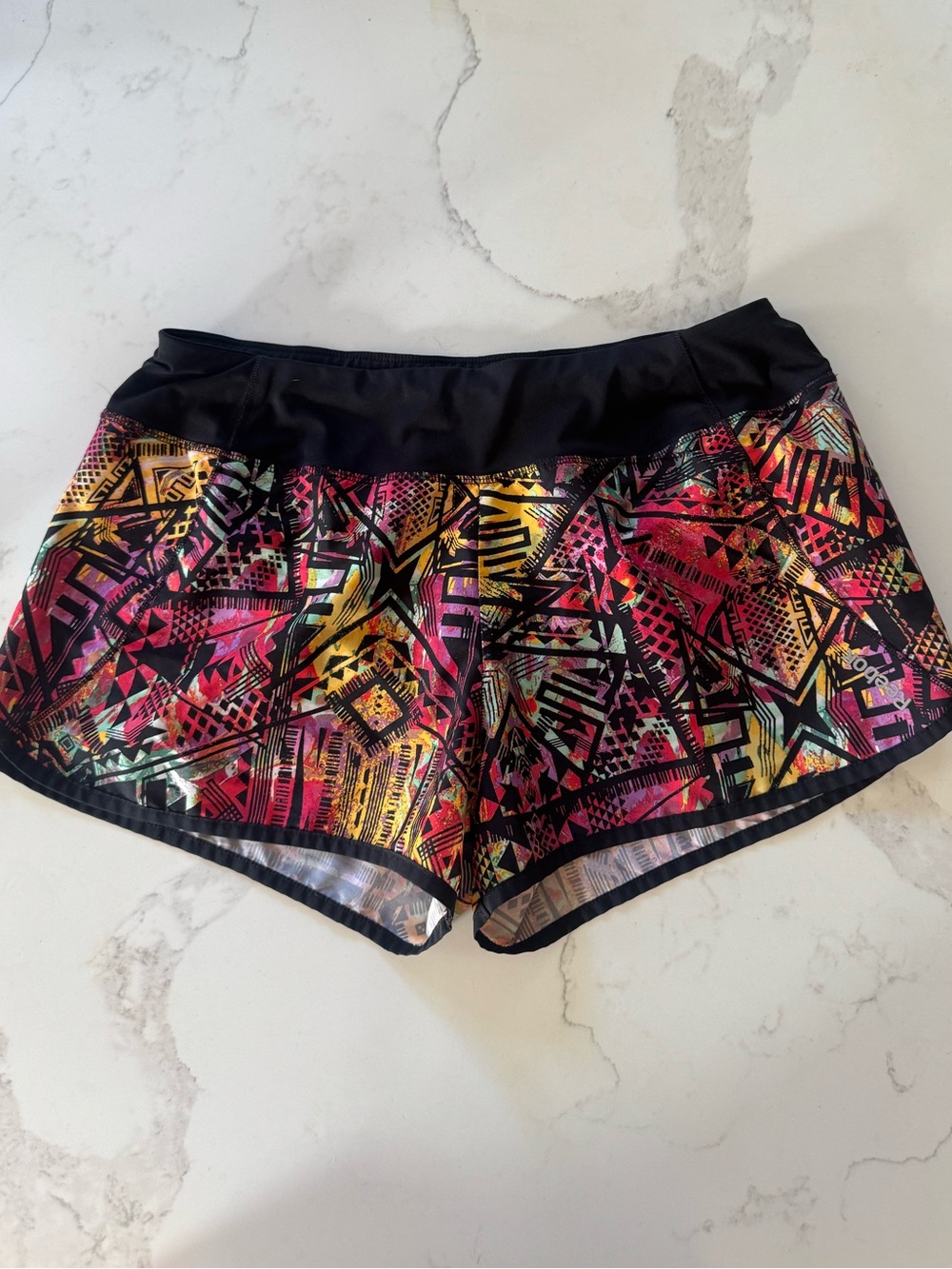 Reebok running shorts - medium -geometric pattern